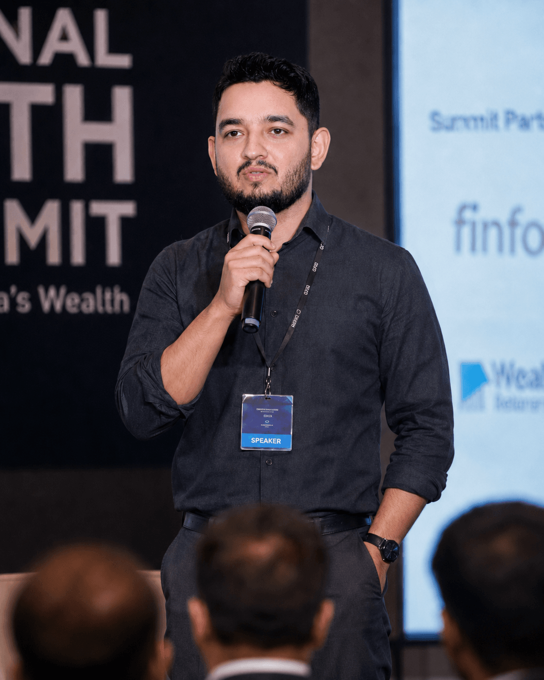 Vaibhav Sharma speaking at an investor summit.